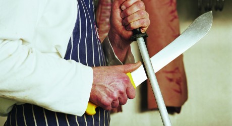 Butcher sharpening knives