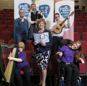 Picture shows :Fiona Hyslop, The Cabinet Secretary for Culture & Europe External Affairs pictured with young performers and musicians at the Youth Music Initiative Evaluation Event in The Studio Edinburgh Festival Theatre, Edinburgh, Scotland.Piper Gre