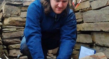 Neil Ackerman investigating the Ness of Brodgar slates